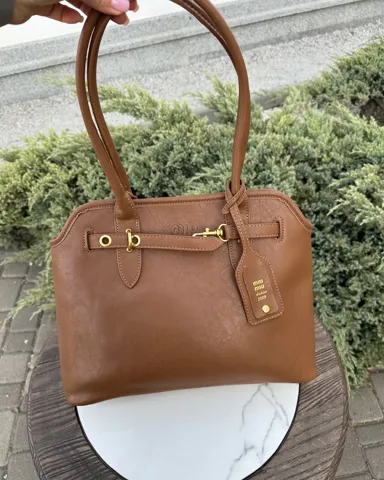 Коричнева