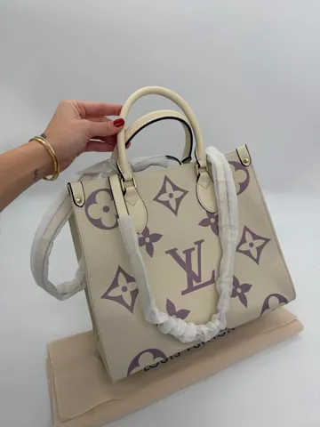 Louis Vuitton Onthego Monogram Empreinte Giant Lilac / Creme