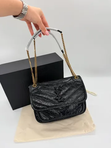 Saint Laurent Niki Vintage Leather in Black / Gold