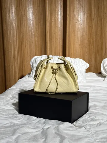 Chanel 25 Micro Handbag in Grained Calfskin in Yellow/Gold